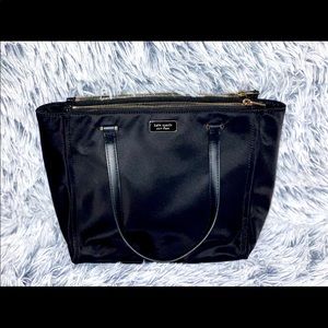 Medium sized roomy black Kate spade bag.